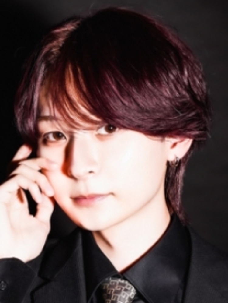 誘